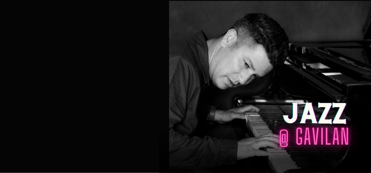 Black and white photo of Dahveed Behroozi playing the piano with "Jazz @ Gavilan" written on it