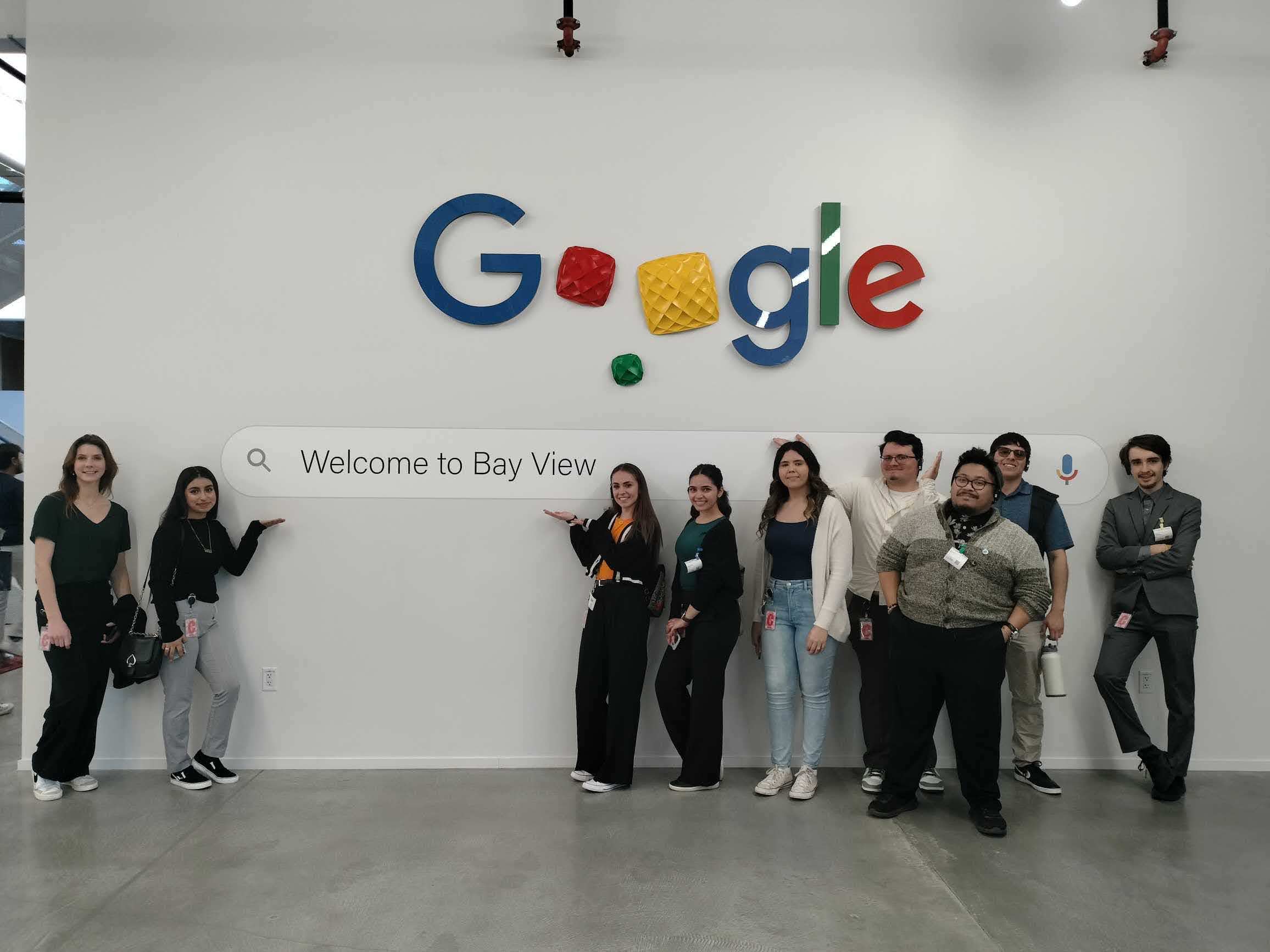 An image of a group of students in front of the Google Search bar