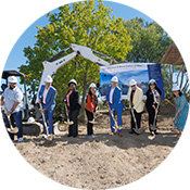 Gavilan College executive team, maintenance team, director of Capital Projects, and academic senate leadership with shovels, breaking ground